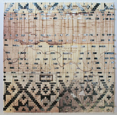 Birch Bark An abstract art piece that overlays angular, geometric design onto historical maps, notably the Ojibwe "kikaigon", also described and shown below. The material, from Sense’s website, includes woven archival inkjet prints on Hahnemuhle bamboo paper. While the geometric patterns take visual precedence, the background complicates the rigid angles through the fluid landmarks–like rivers, mountains, and footpaths–from the maps, as well as the scripted annotations of many of these geographical features. In turn, the text and illustrations on the maps are predominately obscured by the geometric patterns. Through the angular shapes, granular images of shapes appear, such as tree branches, rocks, dirt, and grass.
